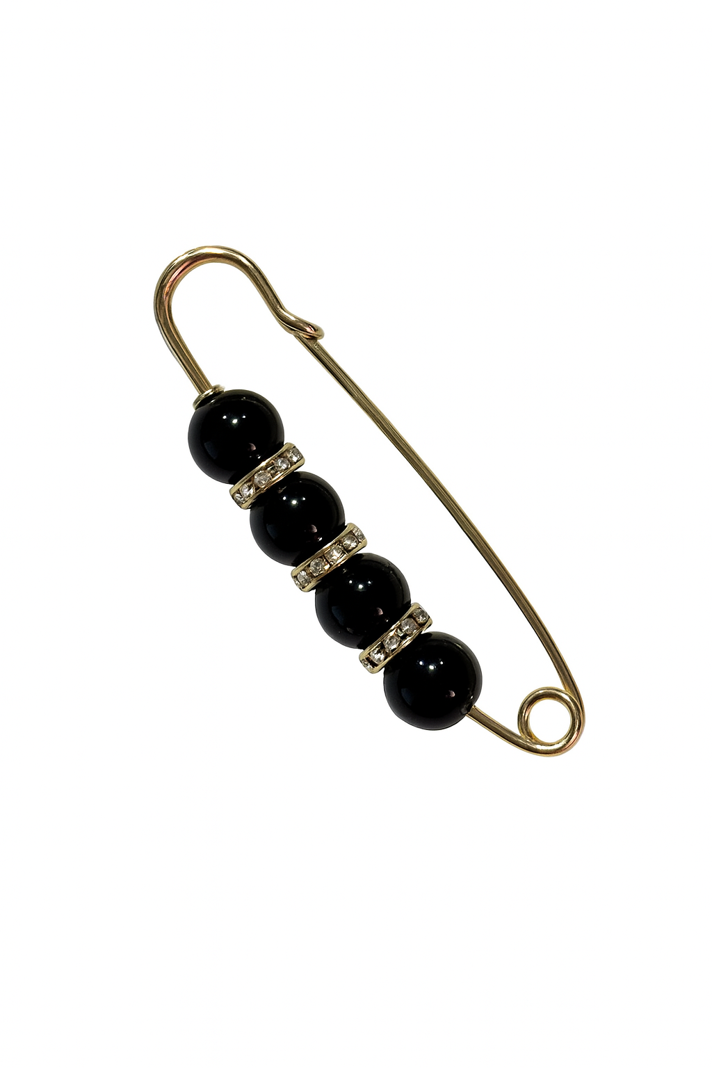 Safety pin with black beads and gold metal on a white background