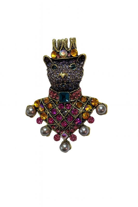 Decorative brooch with a bear design, multicolored gemstones, and a crown on a white background