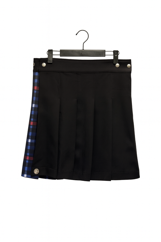 Black kilt with plaid accents on a hanger against a white background
