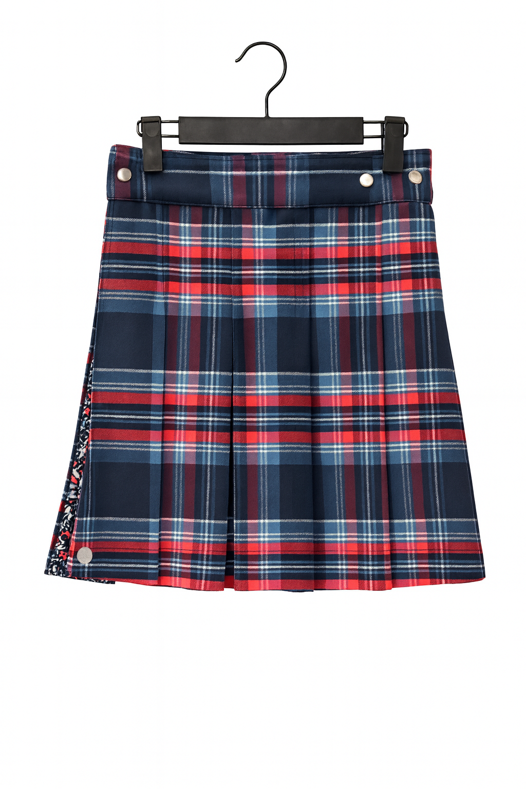 Plaid kilt with red, blue, and white pattern on a hanger against a white background