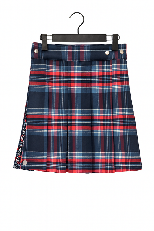 Plaid kilt with red, blue, and white pattern on a hanger against a white background