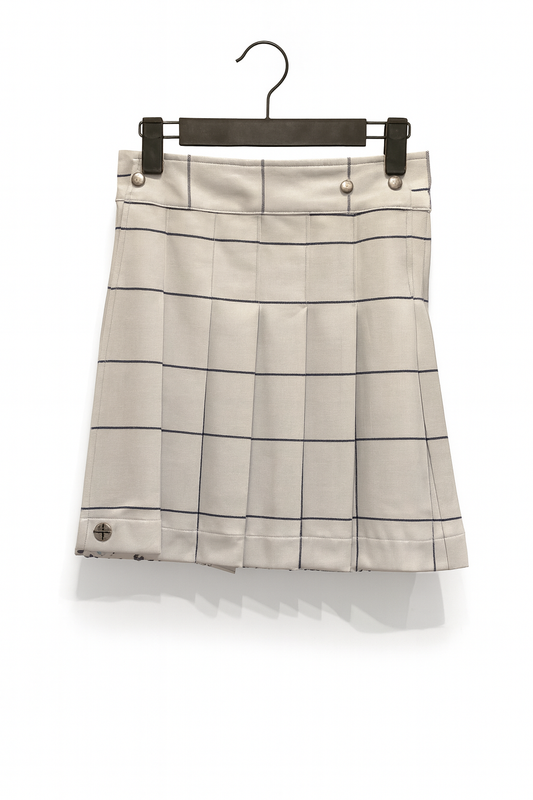 White Plaid kilt on a hanger against a white background