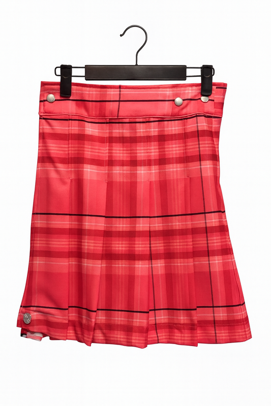 Pink plaid kilt on a hanger against a white background