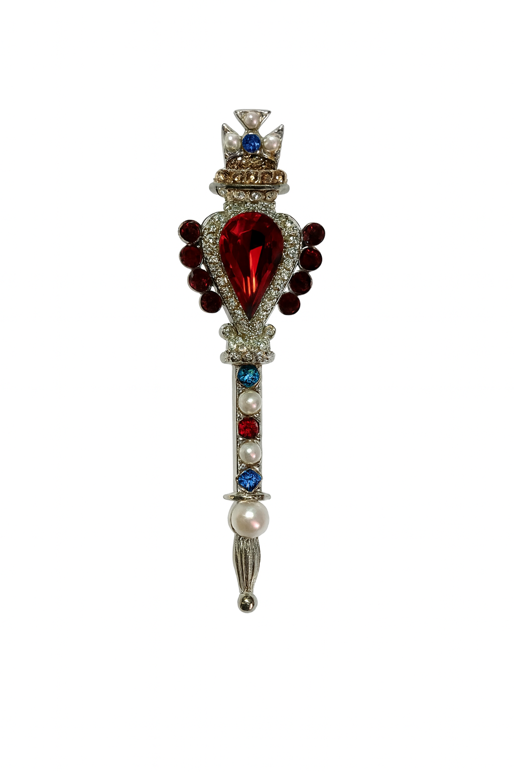 Decorative scepter pin with gemstones on a white background